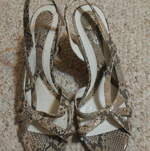 Snakeskin sandles gently worn